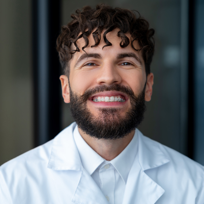How do self-ligating braces work
